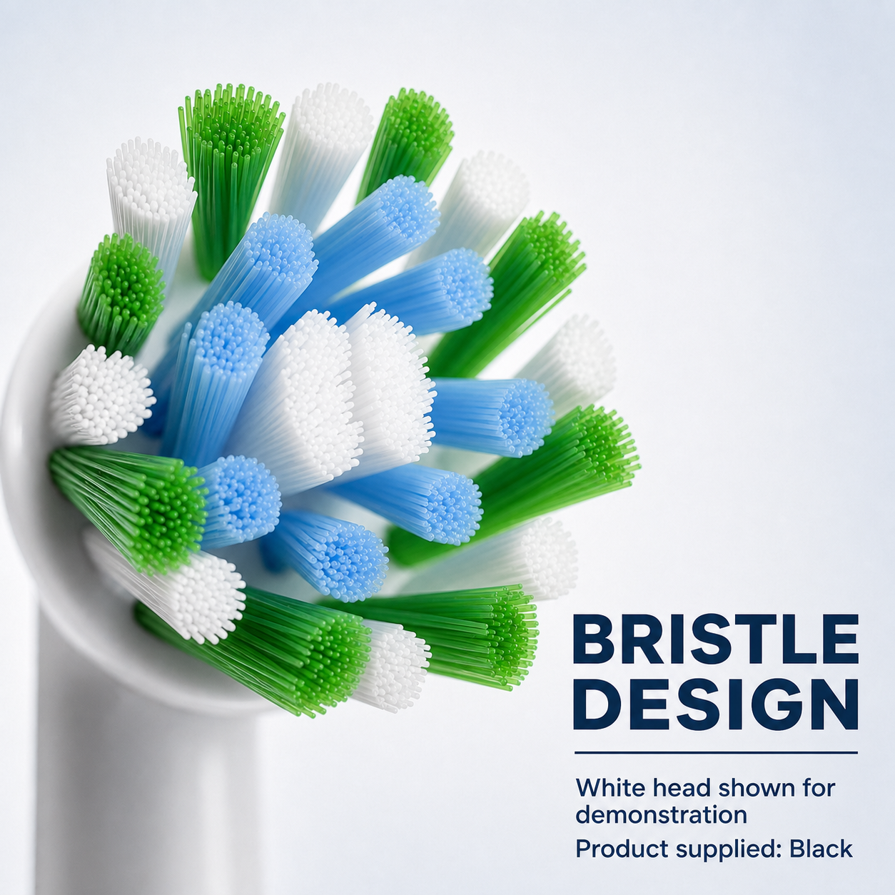 Oral-B Cross Action PRO angled and X-shaped bristles shown on a white demonstration brush head; black heads supplied
